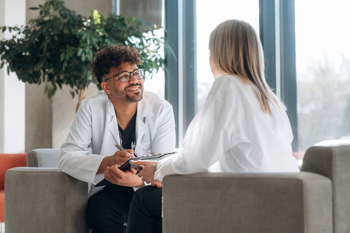 Adult patient discussing ADHD evaluation process with a psychiatric provider during a consultation