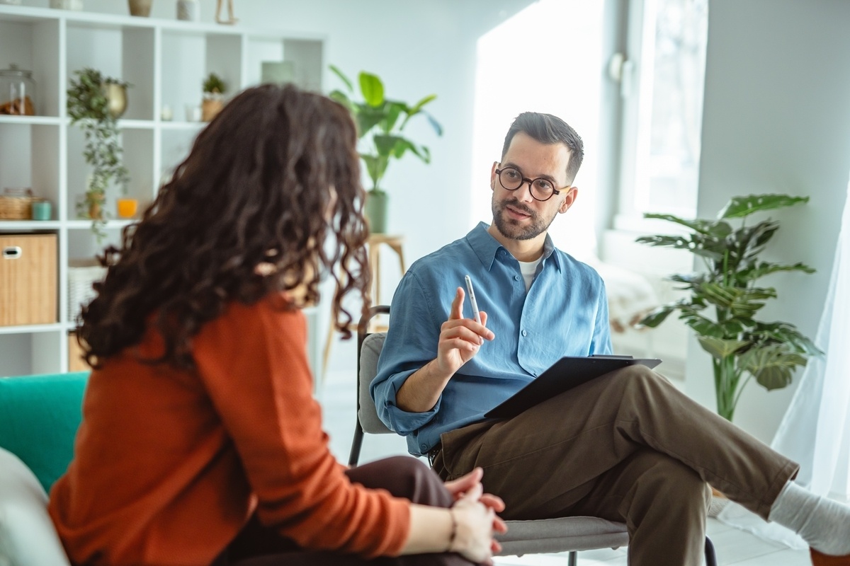 Psychiatric provider consulting with patient about treatment resistant depression in Mesa AZ